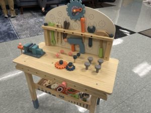 wooden play workbench with play tools