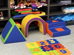 brightly colored padded blocks and mat